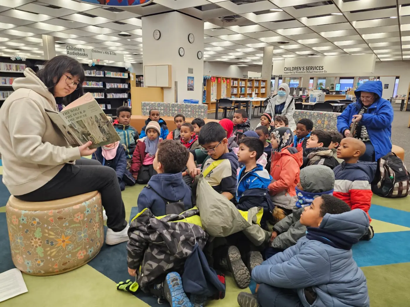 Storytime circle during IQRA's visit to the Winnipeg Public Library