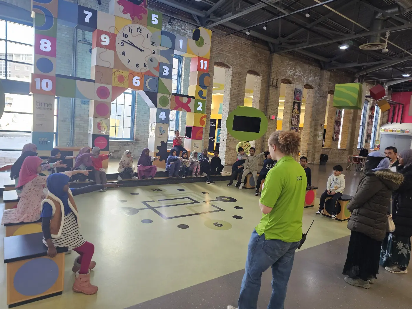 Students in the clock gallery of the Manitoba Children's Museum